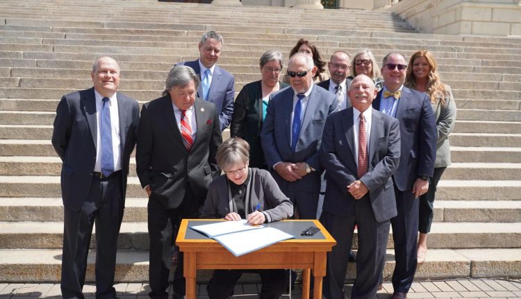 Gov. Laura Kelly Signs Workers' Compensation Bill in Ceremonial Gesture
